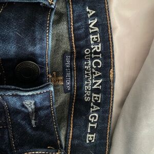AE dark washed skinny jeans